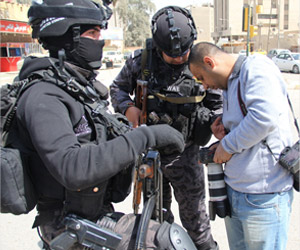 مسلحون ورجال أمن يعتدون على صحفيين جنوب العراق