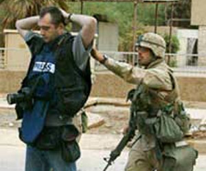 الجيش يعتقل مصوراً صحفياً في بغداد