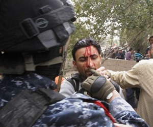 حماية وزير الكهرباء يعتدون على صحفيين في بغداد